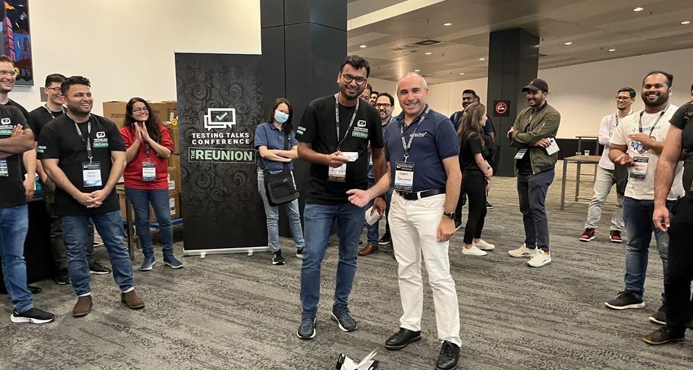 Awarding the Inflectra passport game prize - some Apple airpods